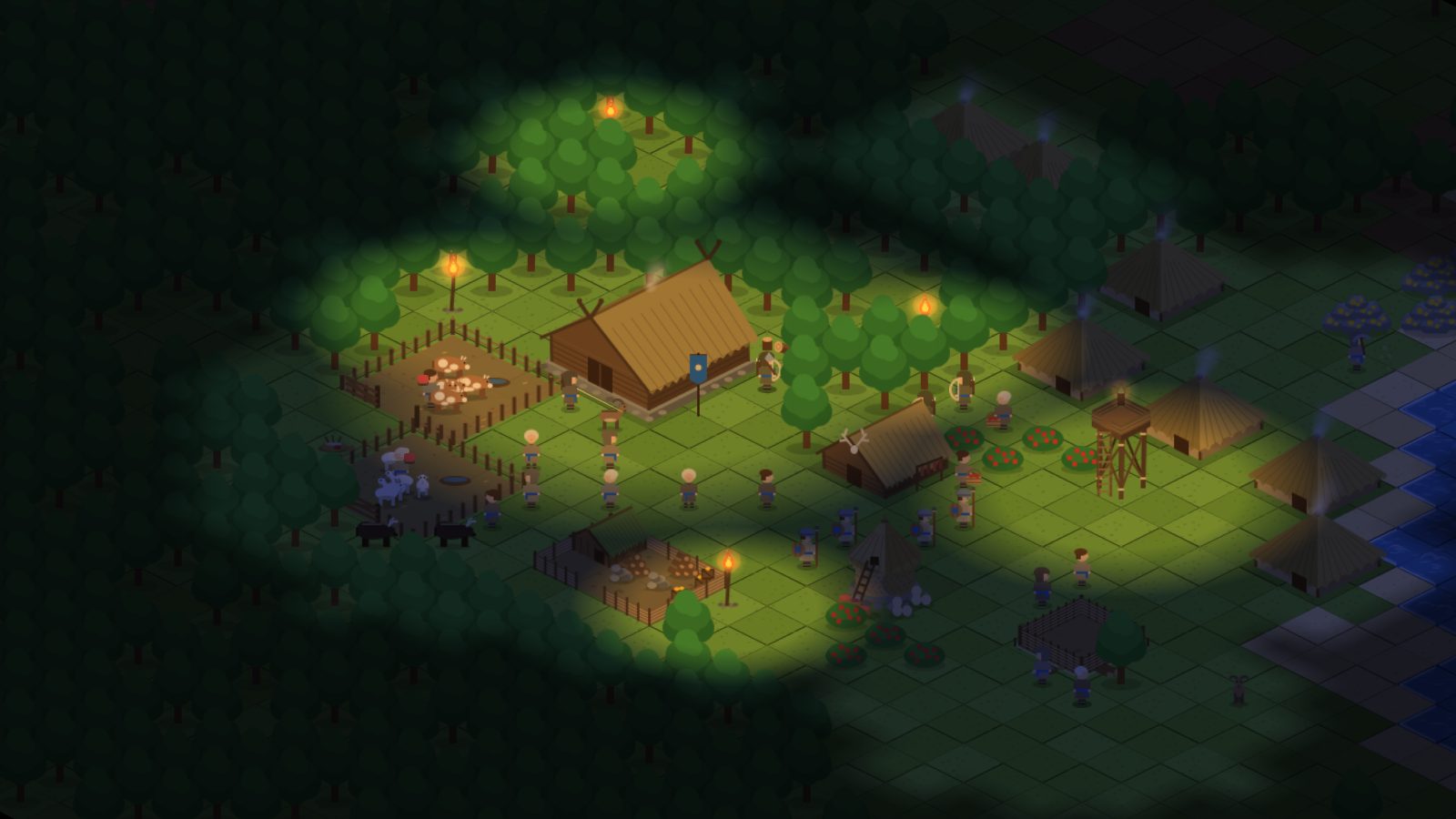 The same village at night, lit by torches with dark forest all around